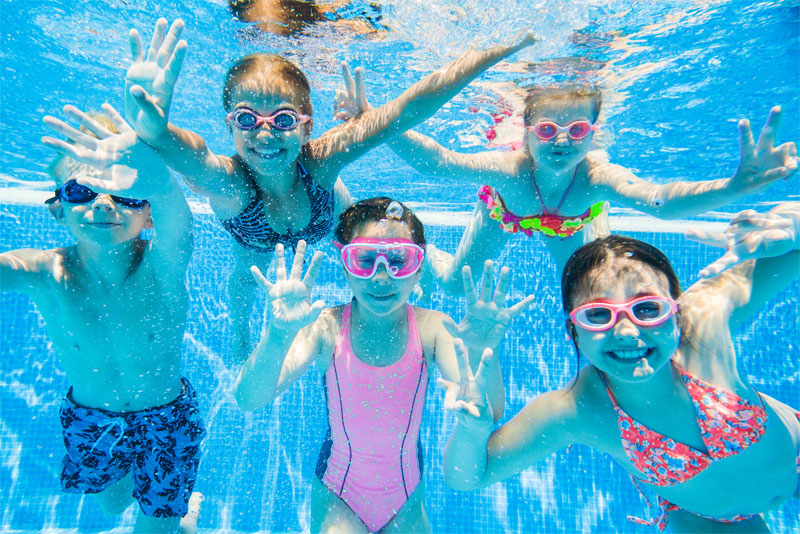 Kids Swimming in Pool